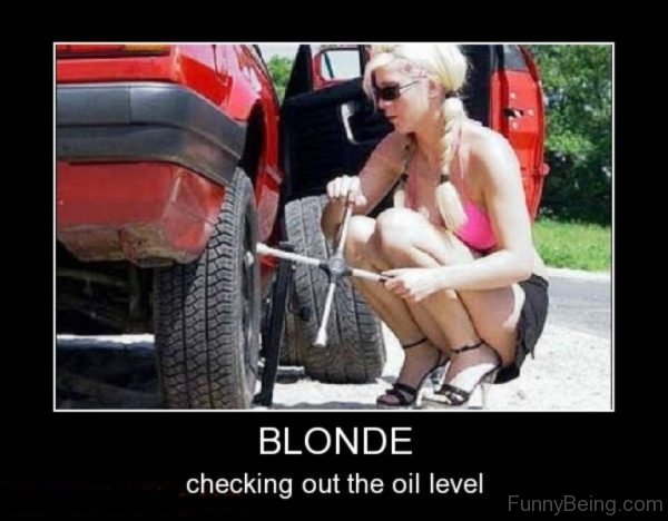 Blonde Checking Out The Oil Level